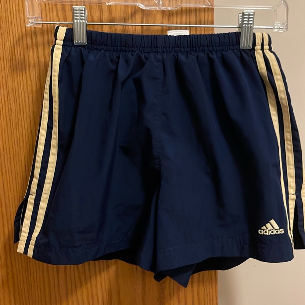 Navy blue and yellow Adidas shorts. Size small